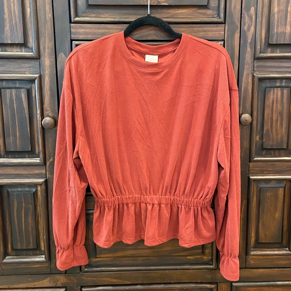 Ribbed Peplum Top